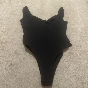 Brand new black bodysuit